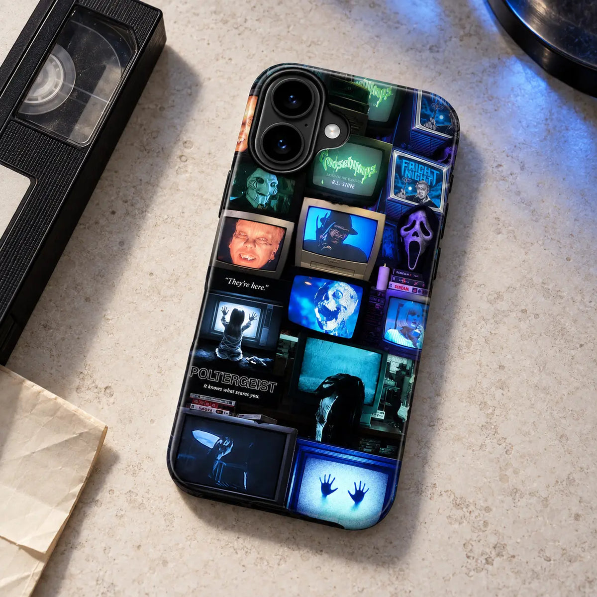 Horror TV collage iPhone case styled with a vintage VHS cassette