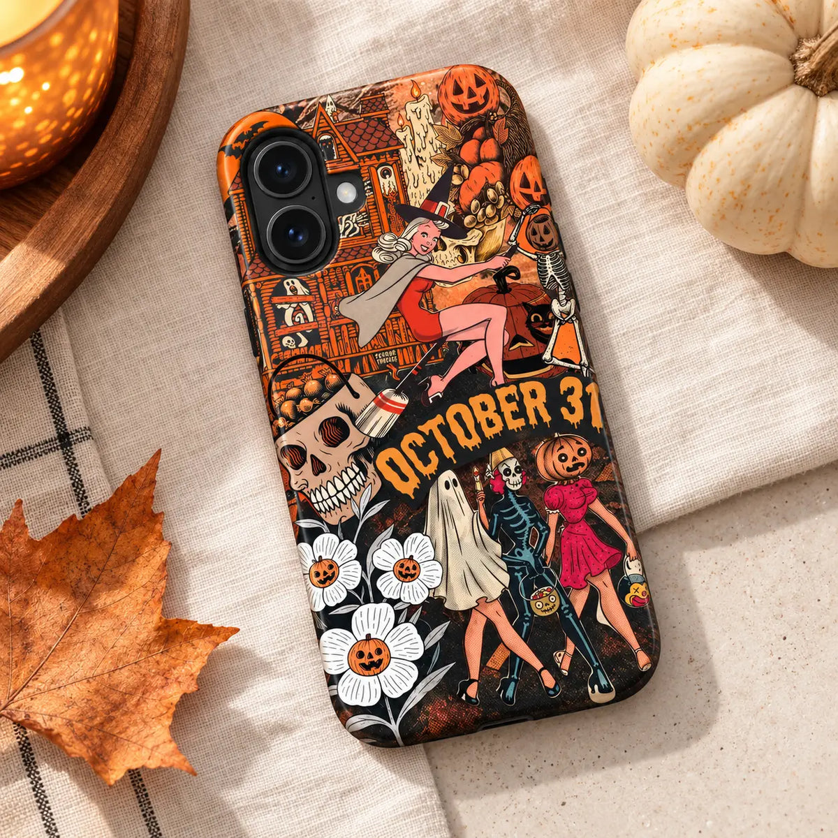 October 31 Halloween iPhone case styled with autumn leaves and pumpkin