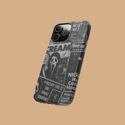 This Halloween phone case features a black and white newspaper-style collage of classic horror movie elements, offering a subtle yet unique accessory.