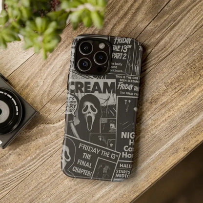 This Halloween phone case features a black and white newspaper-style collage of classic horror movie elements, offering a subtle yet unique accessory.
