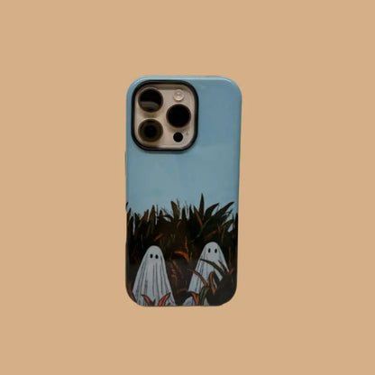 This Halloween phone case features an adorable illustration of cute ghosts in a peaceful autumn scene, adding a unique and cozy festive vibe.