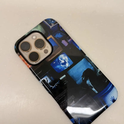 This Halloween phone case features a collage of classic horror movie elements, bringing a trendy vibe that makes it a must-have fashion item for the season.