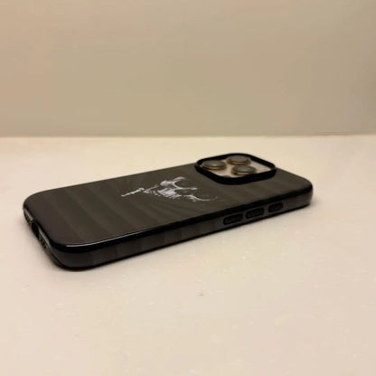 This Halloween phone case features a vintage collage of classic elements like pumpkins, black cats, and skeletons, adding a unique festive vibe.