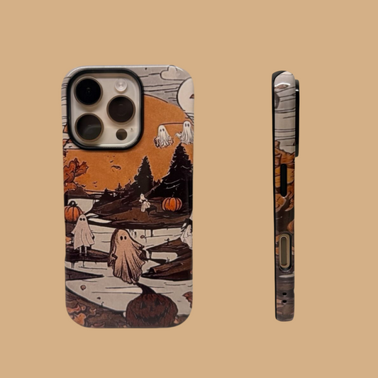 This vintage-style Halloween phone case features a charming illustration of ghosts and pumpkins, adding a unique and cozy autumn vibe to your phone.