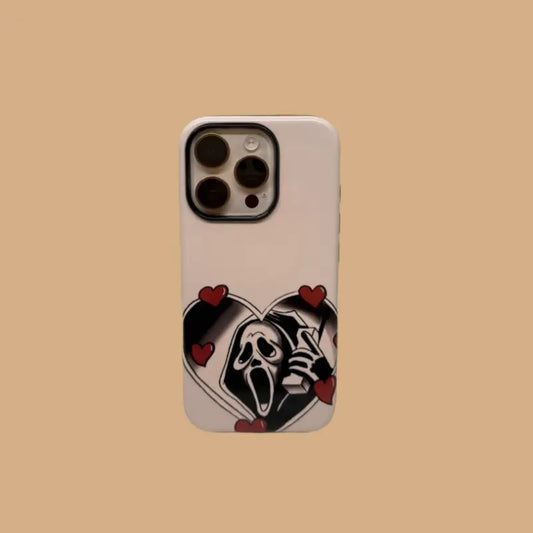 This Halloween phone case features a vintage collage of classic elements like pumpkins, black cats, and skeletons, adding a unique festive vibe.