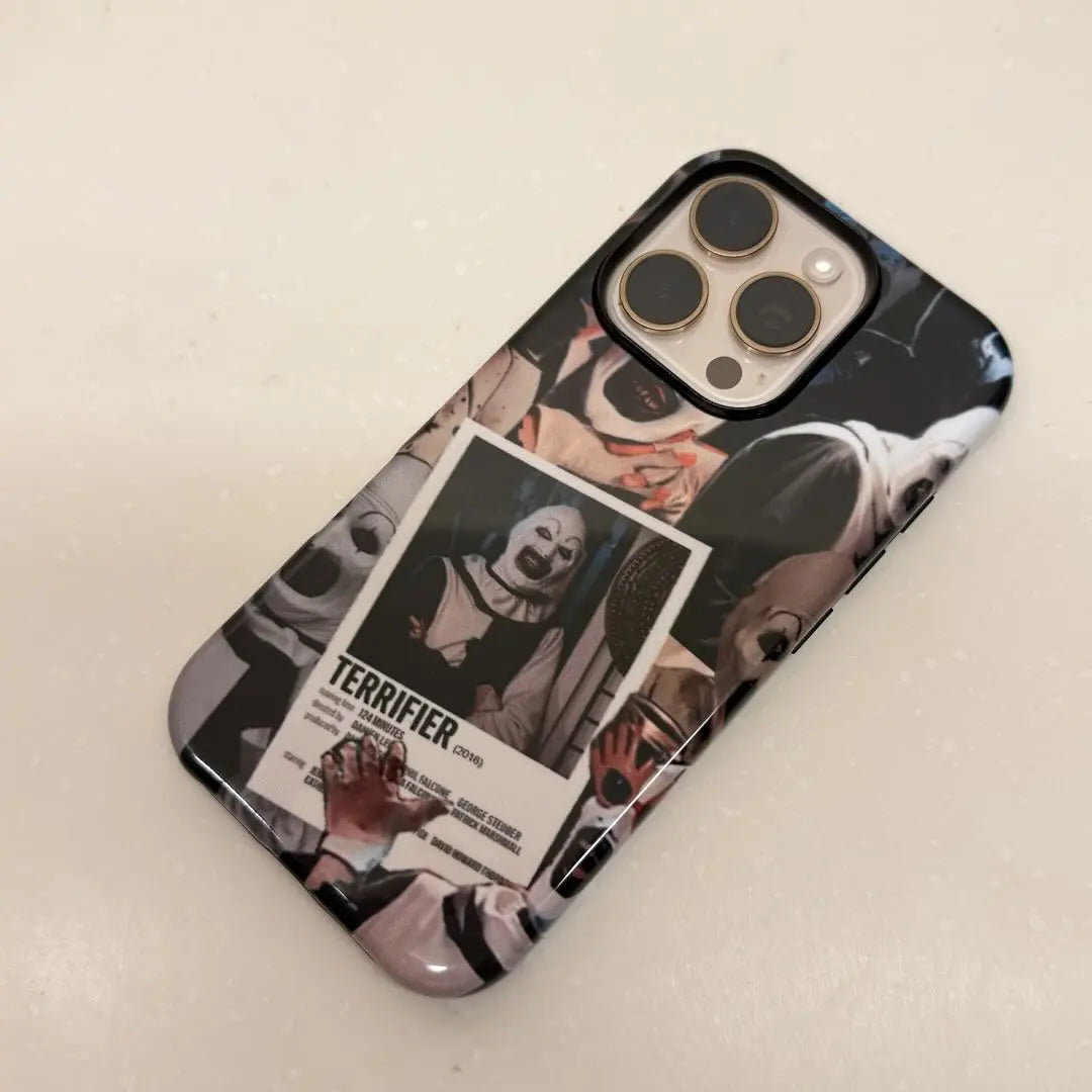 This Halloween phone case perfectly blends classic horror movie elements, bringing a unique trendy vibe that makes it a must-have fashion item for the season.